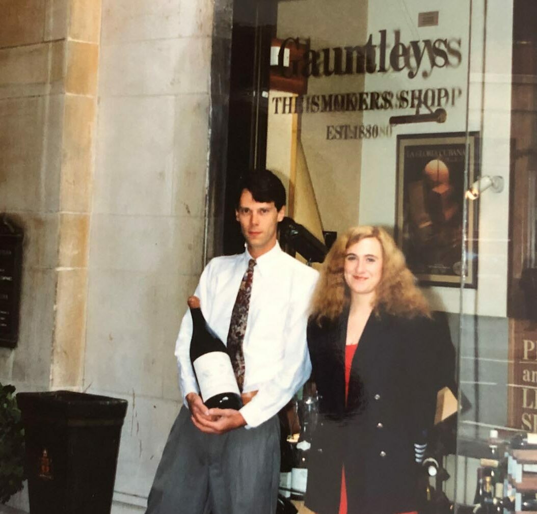 John & Victoria outside wine shop in Nottingham holding a magnum of wine